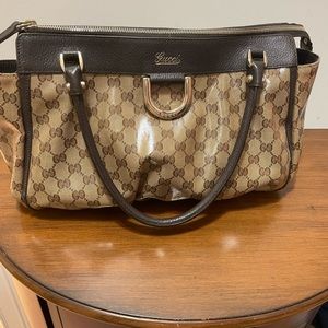 Gucci “doctor bag” style.